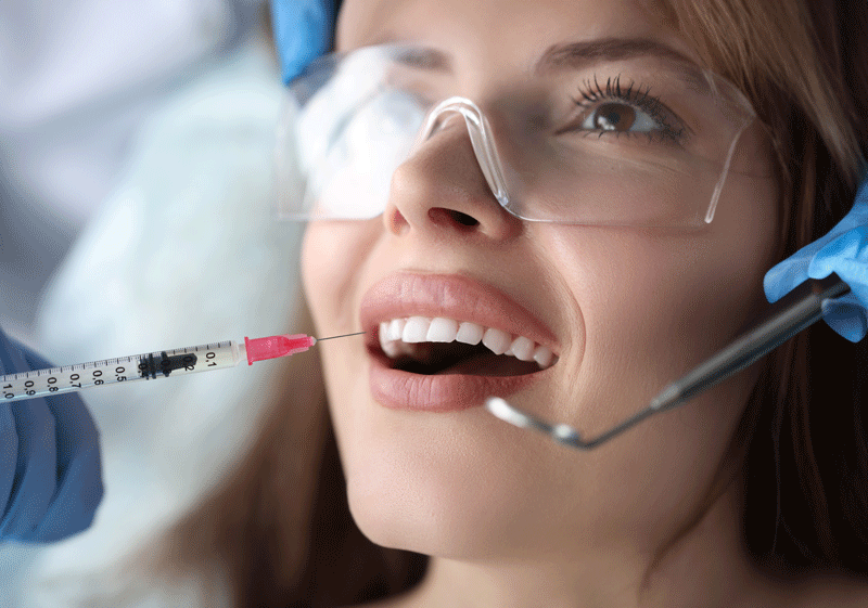 Oral and Maxillofacial surgery resident in training during a surgical simulation training lab